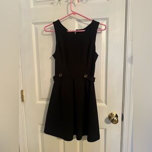 Black Sleeveless Dress with Button Accents